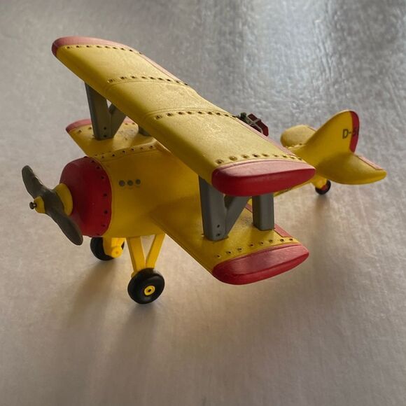DEPARTMENT 56 Spirit of Snow Village Yellow Airplane - Picture 1 of 6